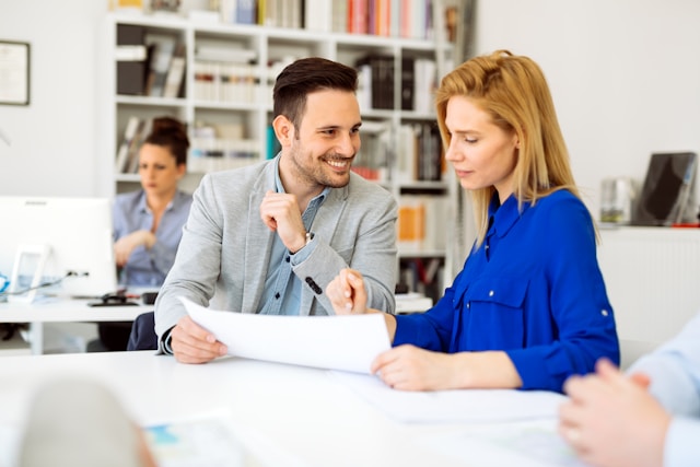 An EA signing a contract with a new company